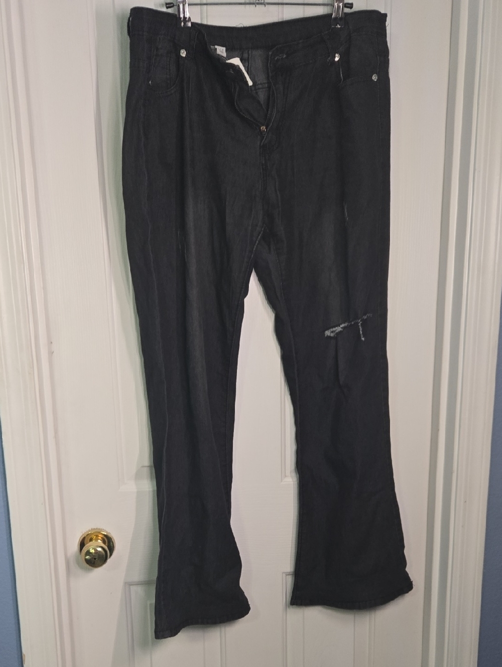 Women's Black Flared Jeans with Subtle Distress